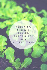 build a raised garden bed in a sloped yard